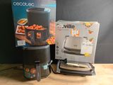 a box of food sitting next to a blender on a table
