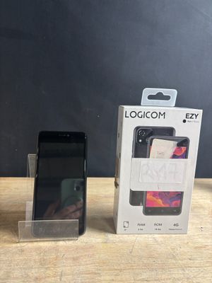 a box with a phone inside of it sitting on a table