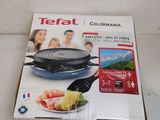 an image of a box of tefal cookware sitting on a table