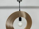 a light that is hanging from the ceiling in the room