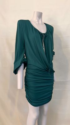 green draped dress on mannequin mannequin mannequin mannequin mannequin mannequin mannequin mannequin mannequin mann