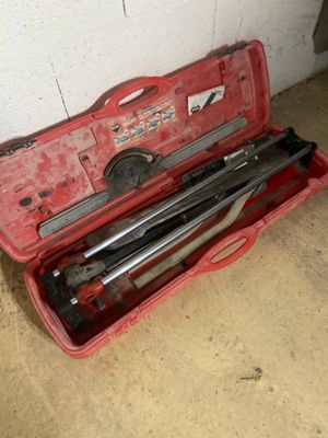 a tool case with tools in it on the floor