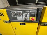 a yellow machine that is sitting in a room