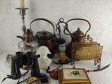a table with a lot of antique items on it