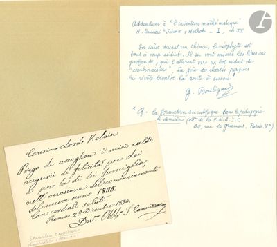 an old letter with a handwritten note on it next to a piece of paper with writing on it