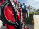 a close up of a red and black skis on the back of a truck