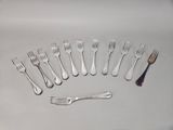 a lot of forks and spoons arranged in a circle