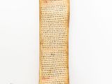 an old scroll with chinese writing on it on a white background
