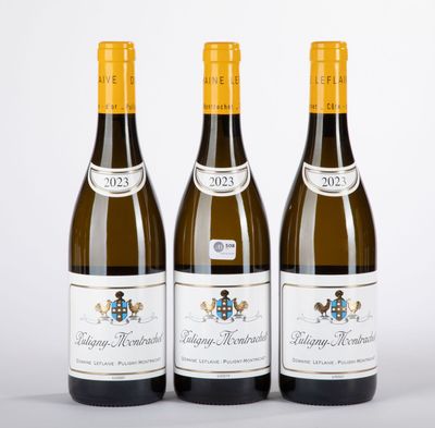 trois bouteilles de vin posées l'une à côté de l'autre sur une table