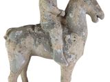 statue of a man riding a horse on a white background