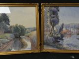 painting of a couple of paintings on a black surface