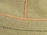 a close up of a piece of cloth with stitching on it