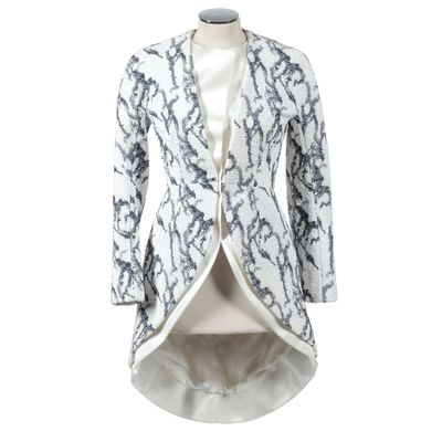 a white and black jacket on a mannequin mannequin mannequin mannequin mannequin mannequin mannequin mannequin mann