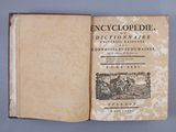 an open book with a picture of a man riding a horse on it