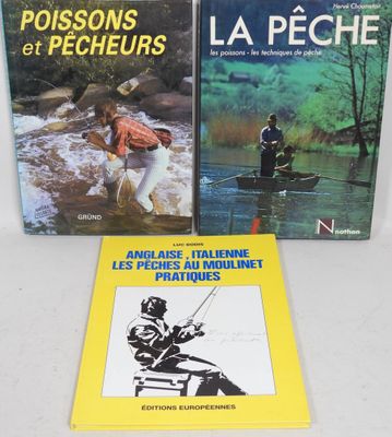 two books on a table with a man in a boat and a man in a kayak