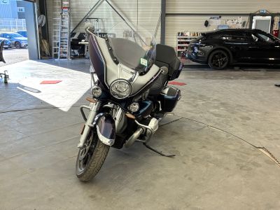 a motorcycle that is parked in a garage