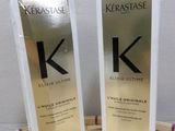 two bottles of kerastasee ultimate kerattasee hair oil