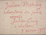 an old handwriting on a piece of cloth with a picture of a woman