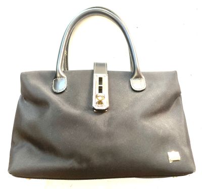 a black handbag with a silver handle on a white background