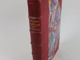 un livre rouge avec une couverture rouge et un autocollant jaune dessus