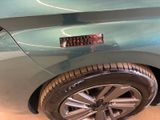a close up of a car with a sticker on the side of it