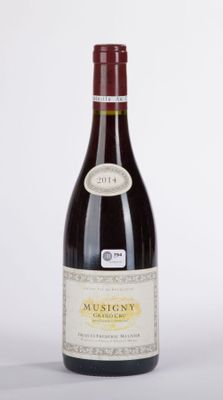 a bottle of wine that is sitting on a table