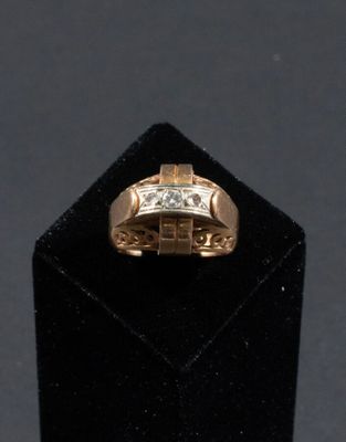 Bague tank en or rose et platine centrée d'une ligne de diam…