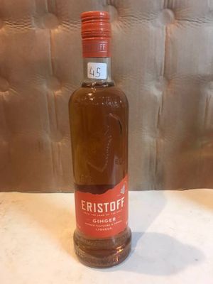 a bottle of whisky sitting on a table