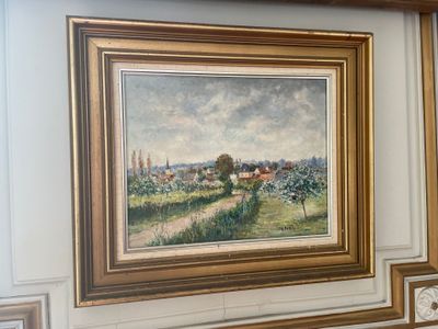 a picture of a painting on the wall of a room