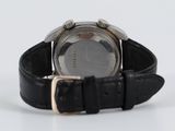 a watch that is sitting on top of a black strap