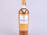 a bottle of macallan single malt whisky on a white background