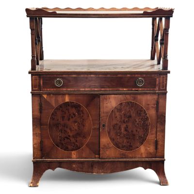 an antique wooden cabinet with two doors and two drawers