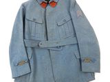 an image of a blue coat with a red bow tie