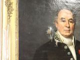 portrait of a man with a rose in his hand in a gold frame