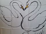 a white flag with two swans on it that says burberry