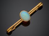 a gold and oplite bar broochle