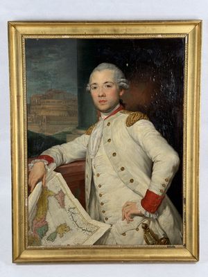 portrait of a man in a military uniform holding a map