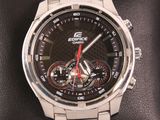 a close up of a wrist watch on a watch case