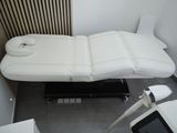 an overhead view of a massage table in a room