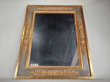 a mirror that is hanging on the wall