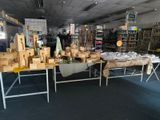 a table with boxes and boxes on it in a store