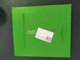 an image of a green box with a sticker on it