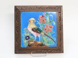 a picture of a painting of a bird on the wall