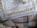 a table cloth with a bunch of lavenders on it