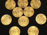 six gold coins are arranged in a circle on a black surface