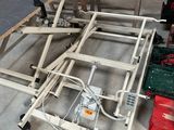 a picture of a metal bed frame in a garage