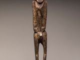 an image of a statue of a man with a smile on his face