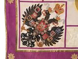 an image of a flag with a coat of arms on it