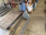 a picture of a fork lift truck in a warehouse