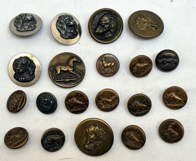 several different types of buttons are shown on a white surface
